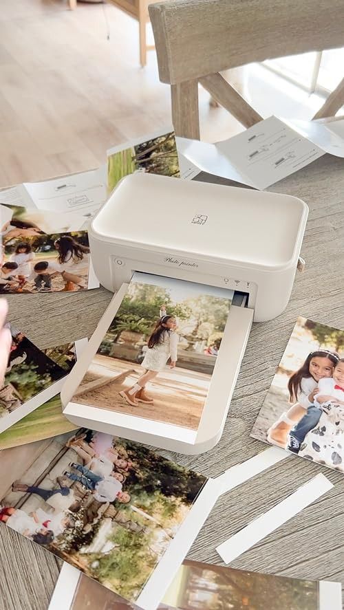 Impresora: Componente que produce las fotografías tomadas